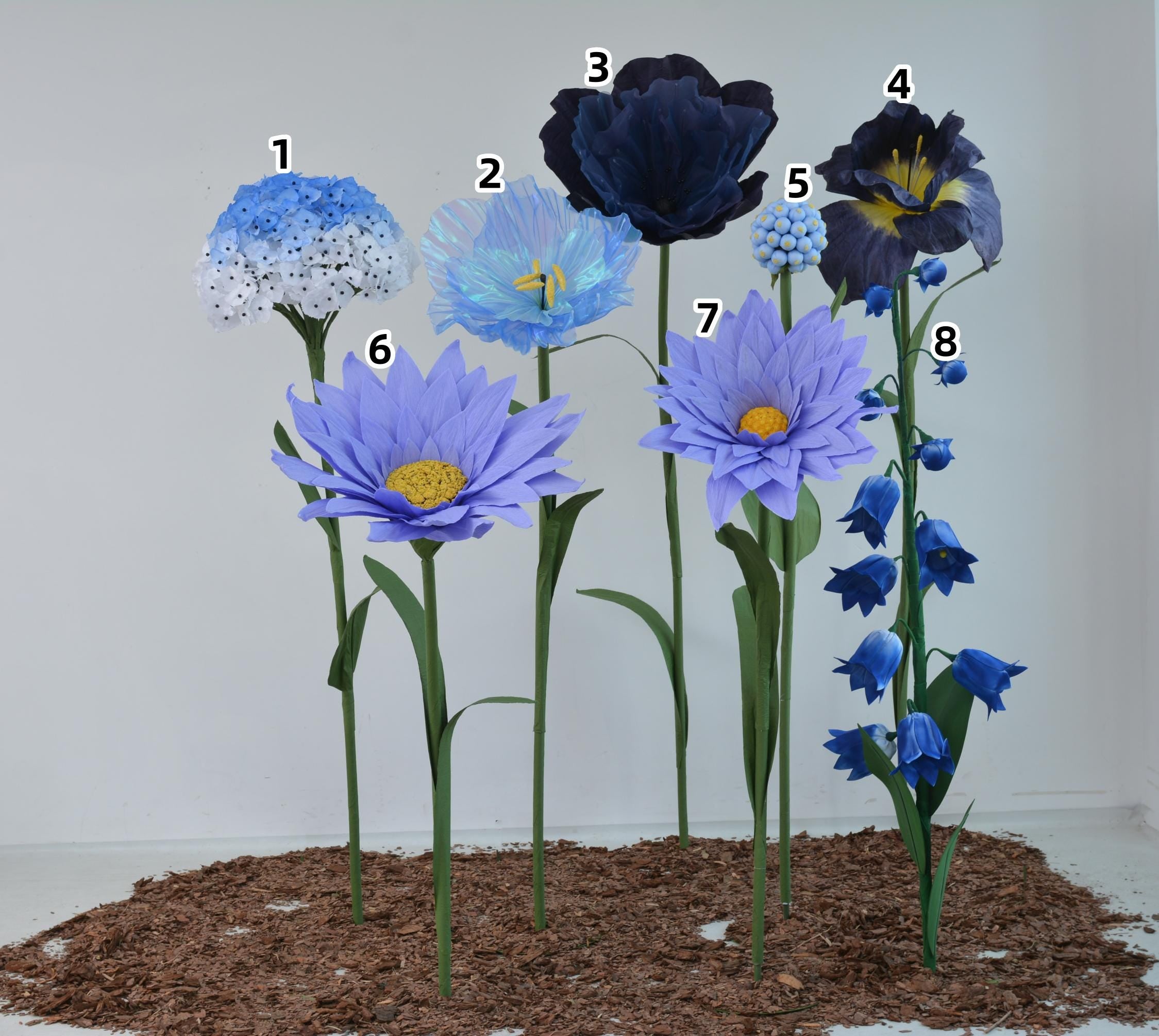 Giant Freestanding Flowers in Paper, Silk, and EVA for Window Displays and Event Decor