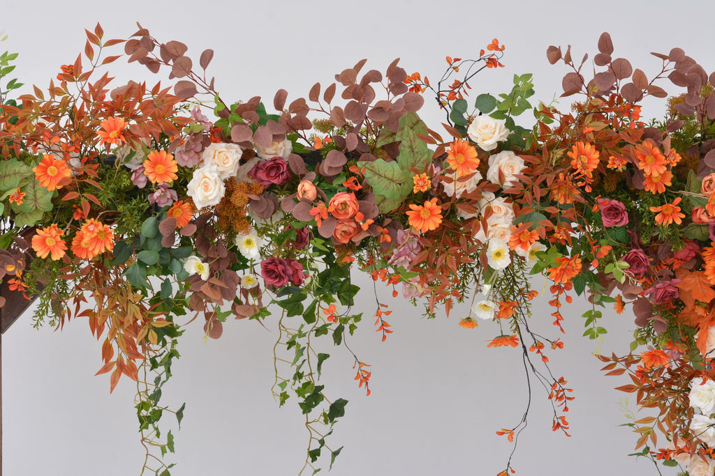Fall Wedding Floral Arrangement with Pops of Orange, Red, and Champagne