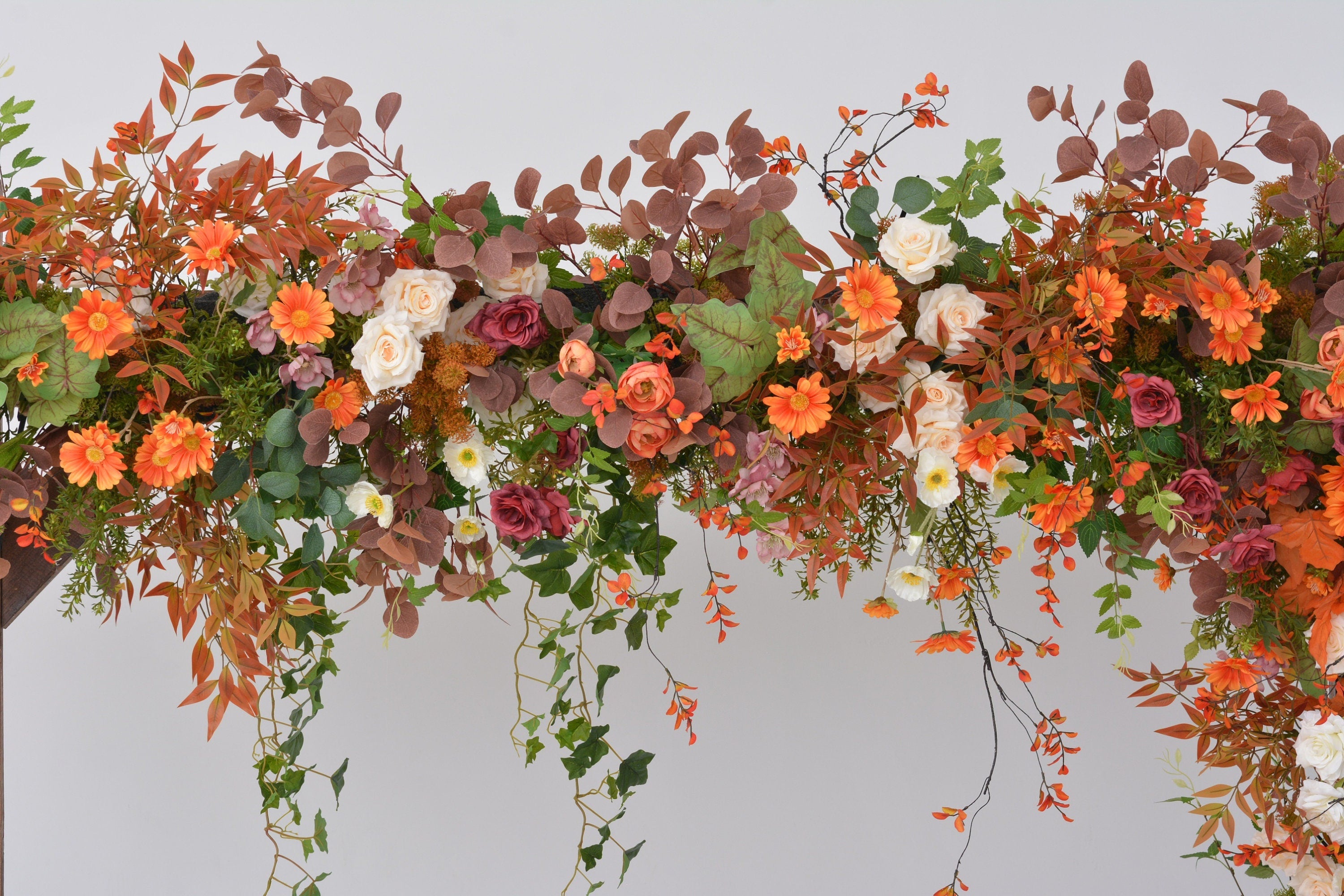 Fall Wedding Floral Arrangement with Pops of Orange, Red, and Champagne