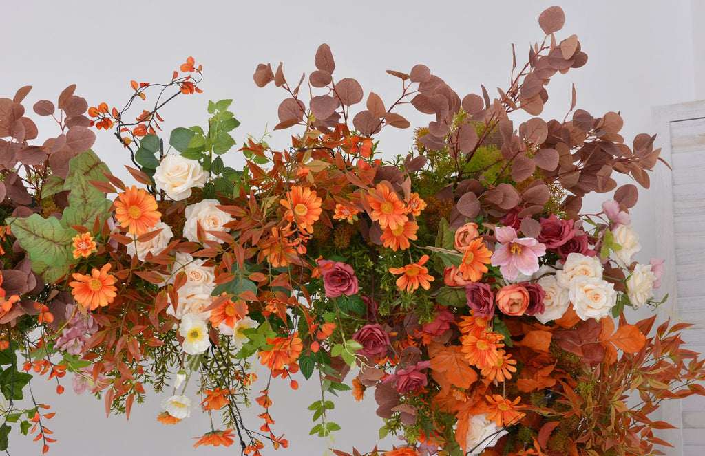 Fall Wedding Floral Arrangement with Pops of Orange, Red, and Champagne