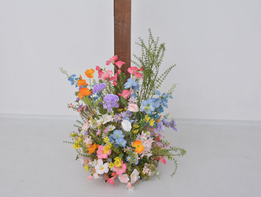 Pastel Wildflower Wedding Arbor Arrangements with Light Pink, Orange, Purple, and Blue Accents