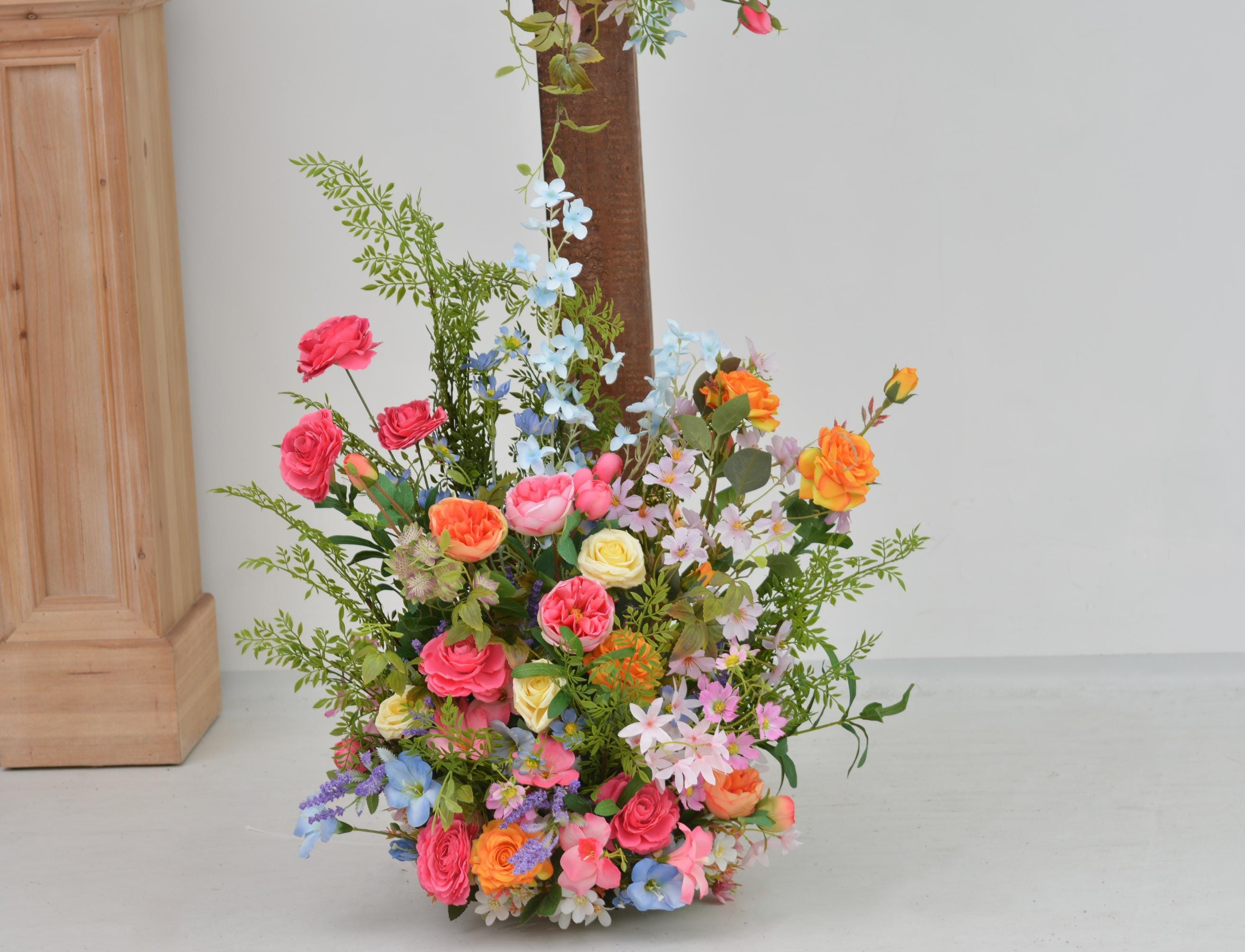 Arch Wildflowers Floral Arrangement with Hot Pink, Light Blue, Orange, and Pale Purple