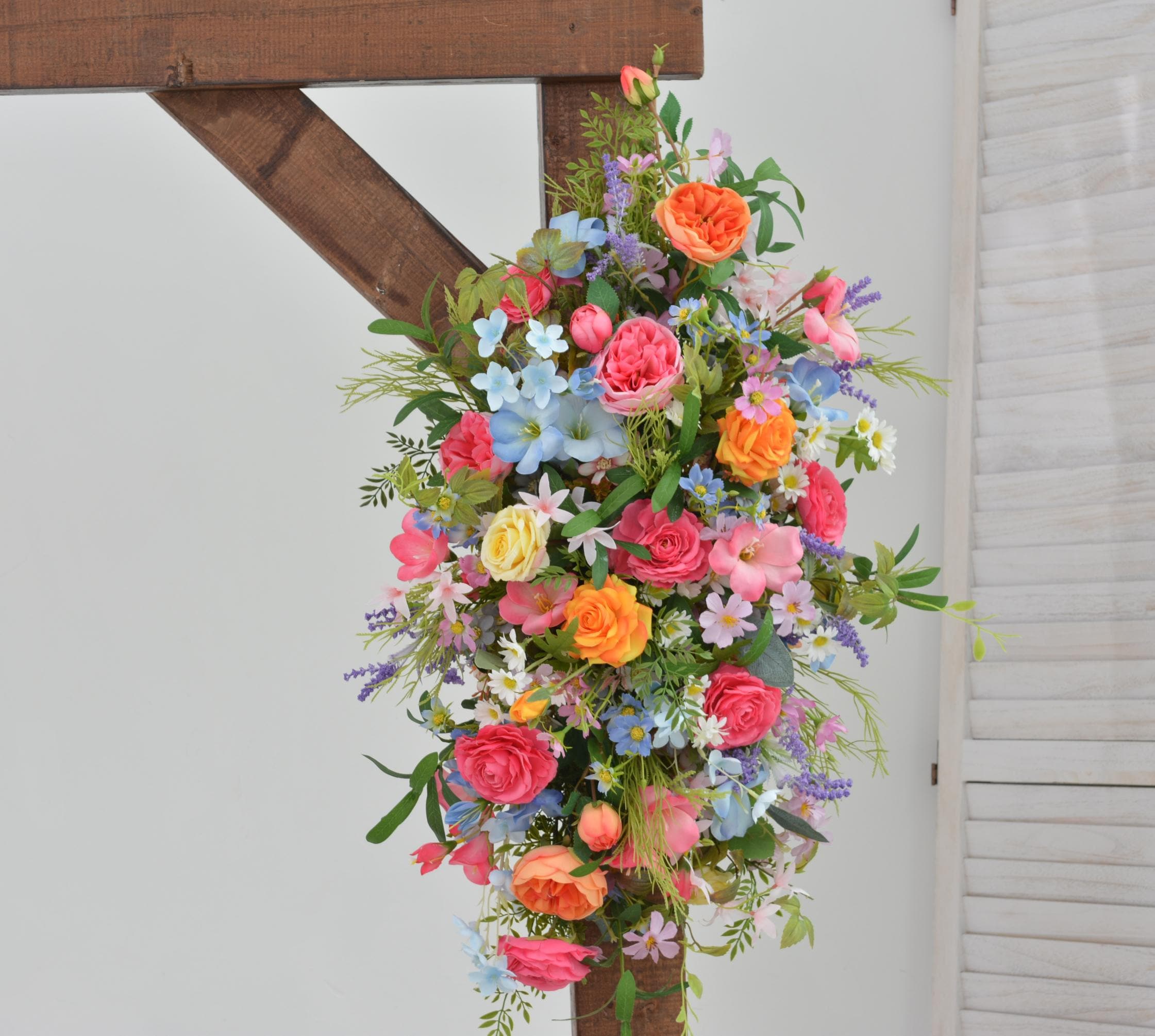 Arch Wildflowers Floral Arrangement with Hot Pink, Light Blue, Orange, and Pale Purple