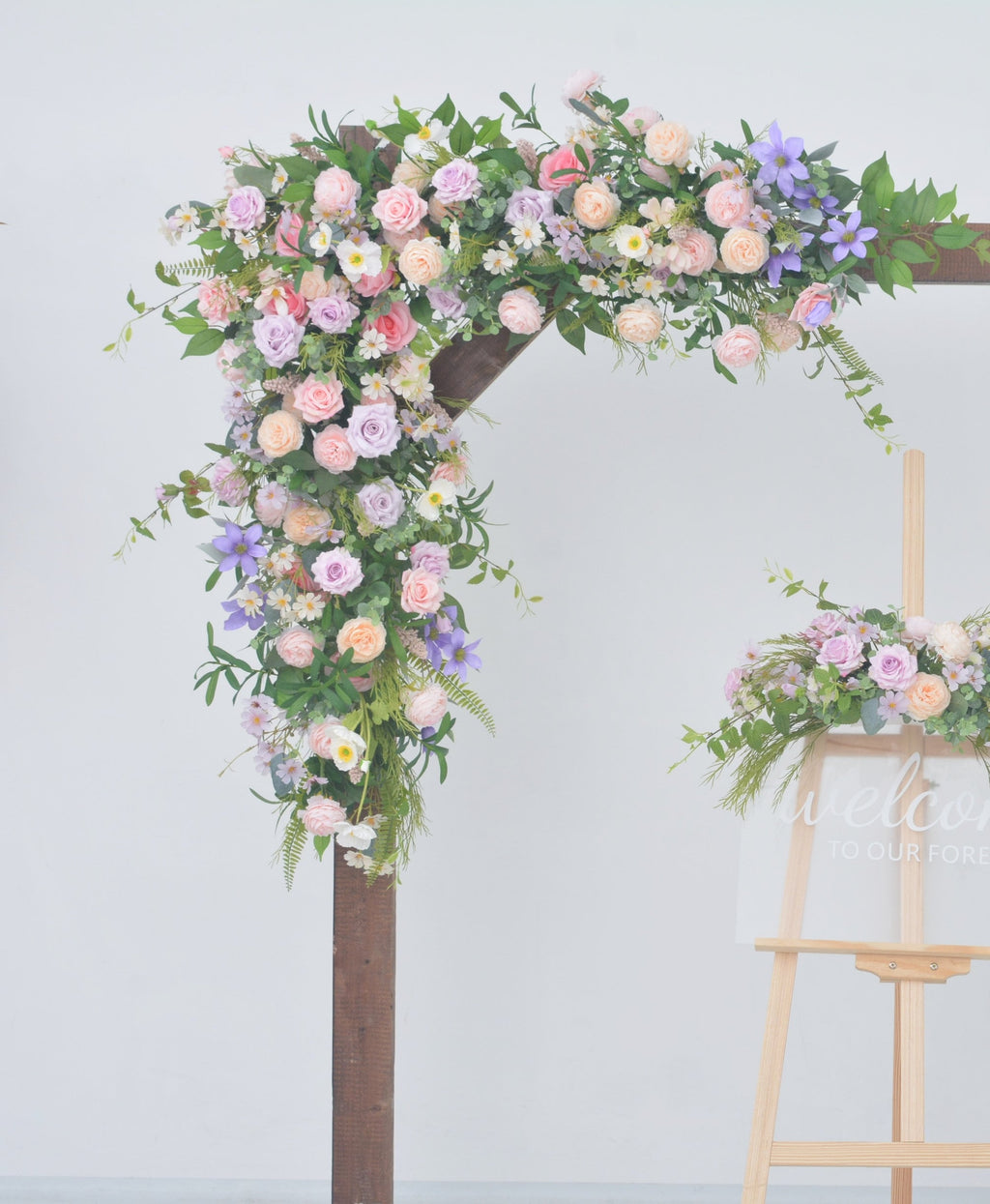 Artificial Wedding Arch Arrangements with Flowers in Shades of Pink, Purple and Champagne