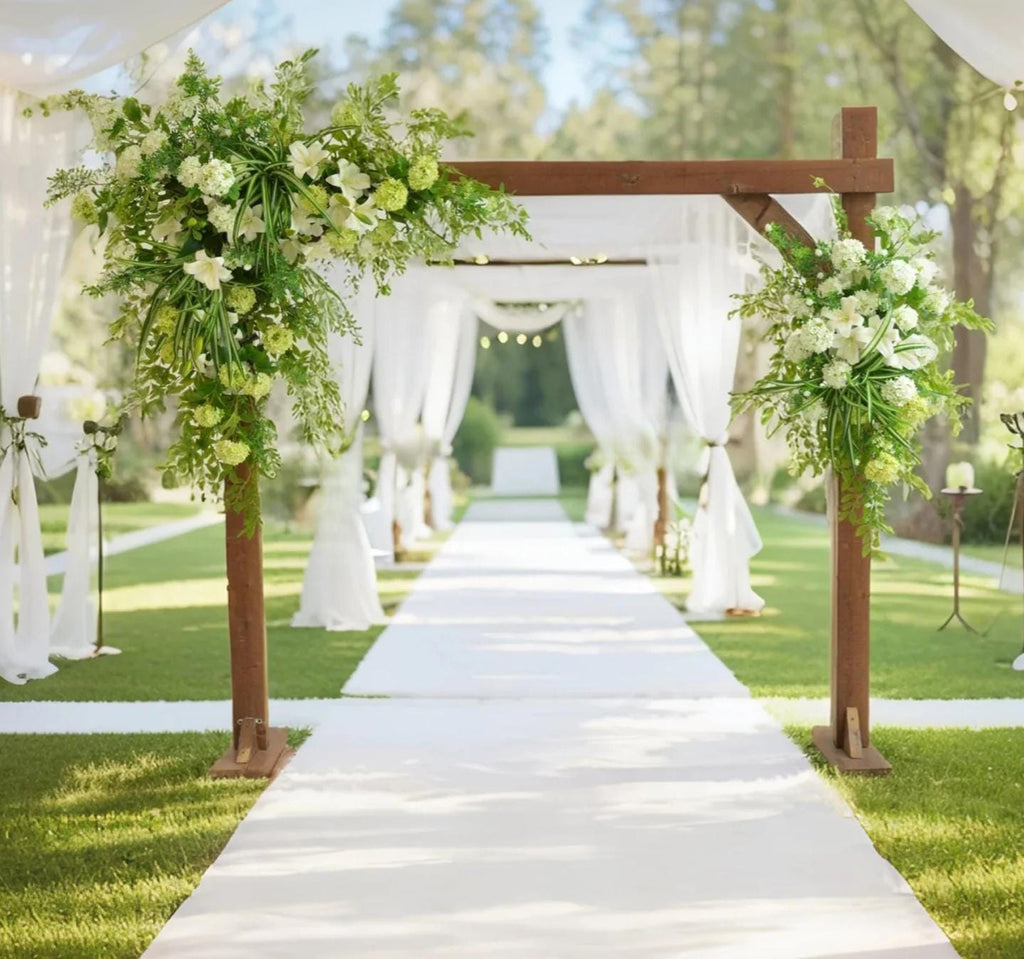 Elegant Wedding Arch with White and Green Floral Arrangement