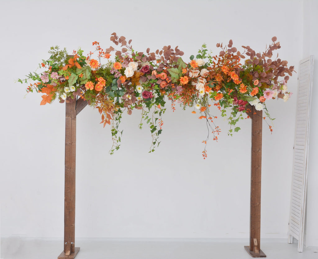 Fall Wedding Floral Arrangement with Pops of Orange, Red, and Champagne