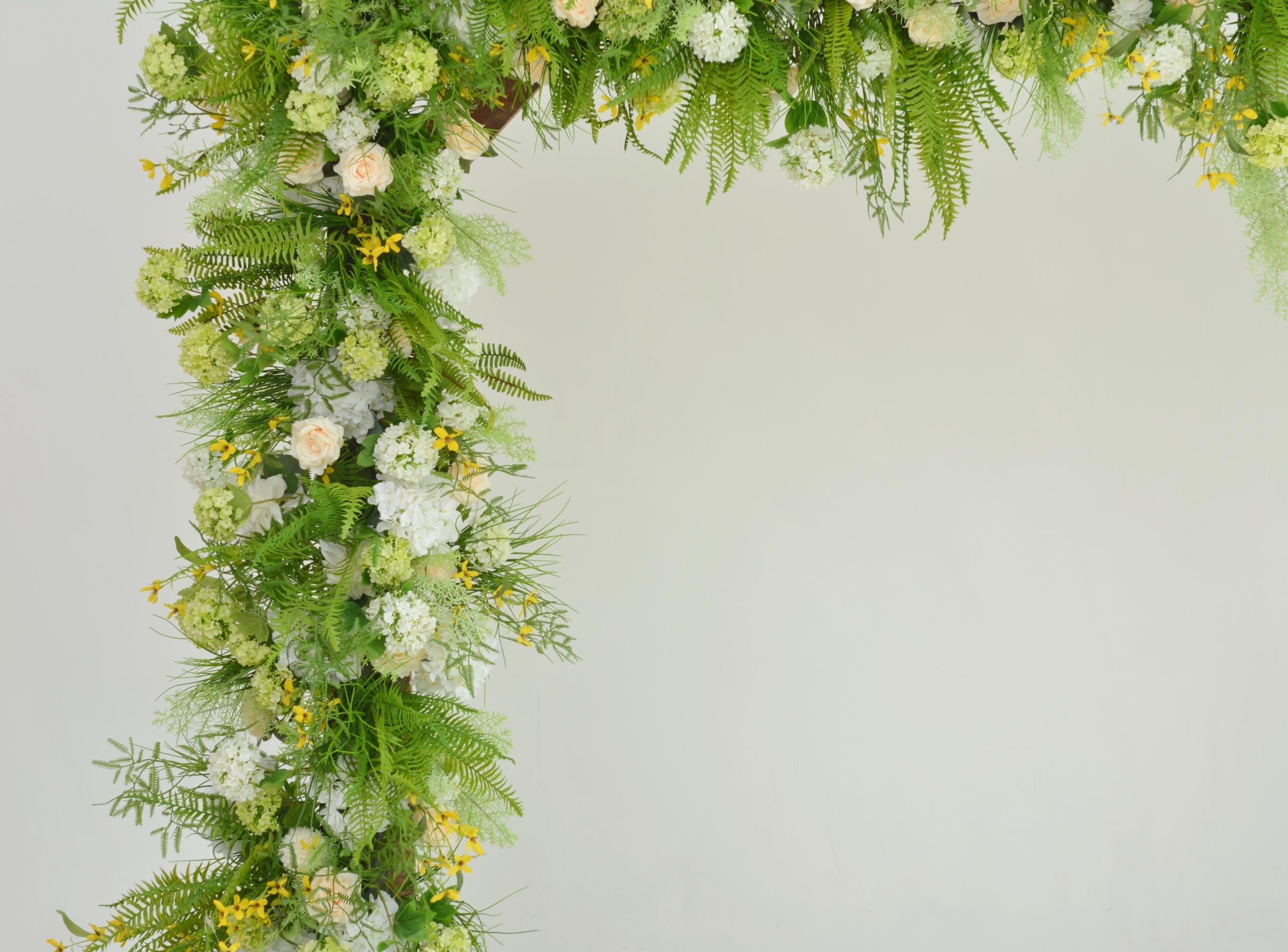Greenery Wedding Arch Arrangement in Shades of Green, White, Champagne, and Yellow