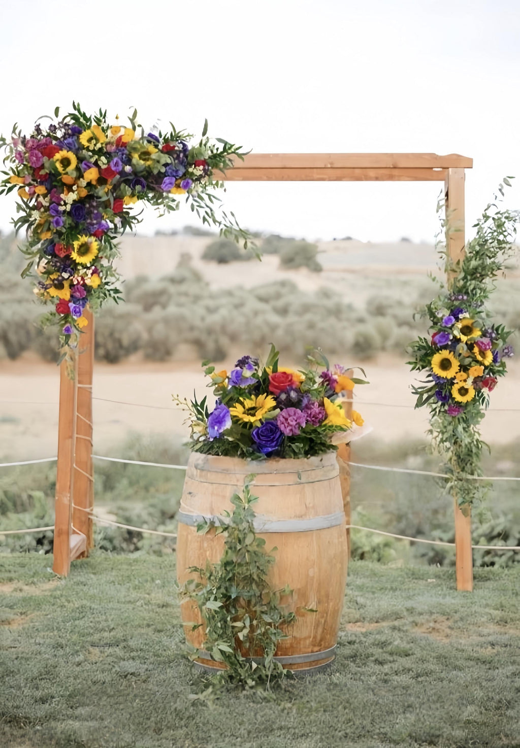 Sunflower Wedding Arch Arrangement: Purple Lisianthus, Crimson Roses