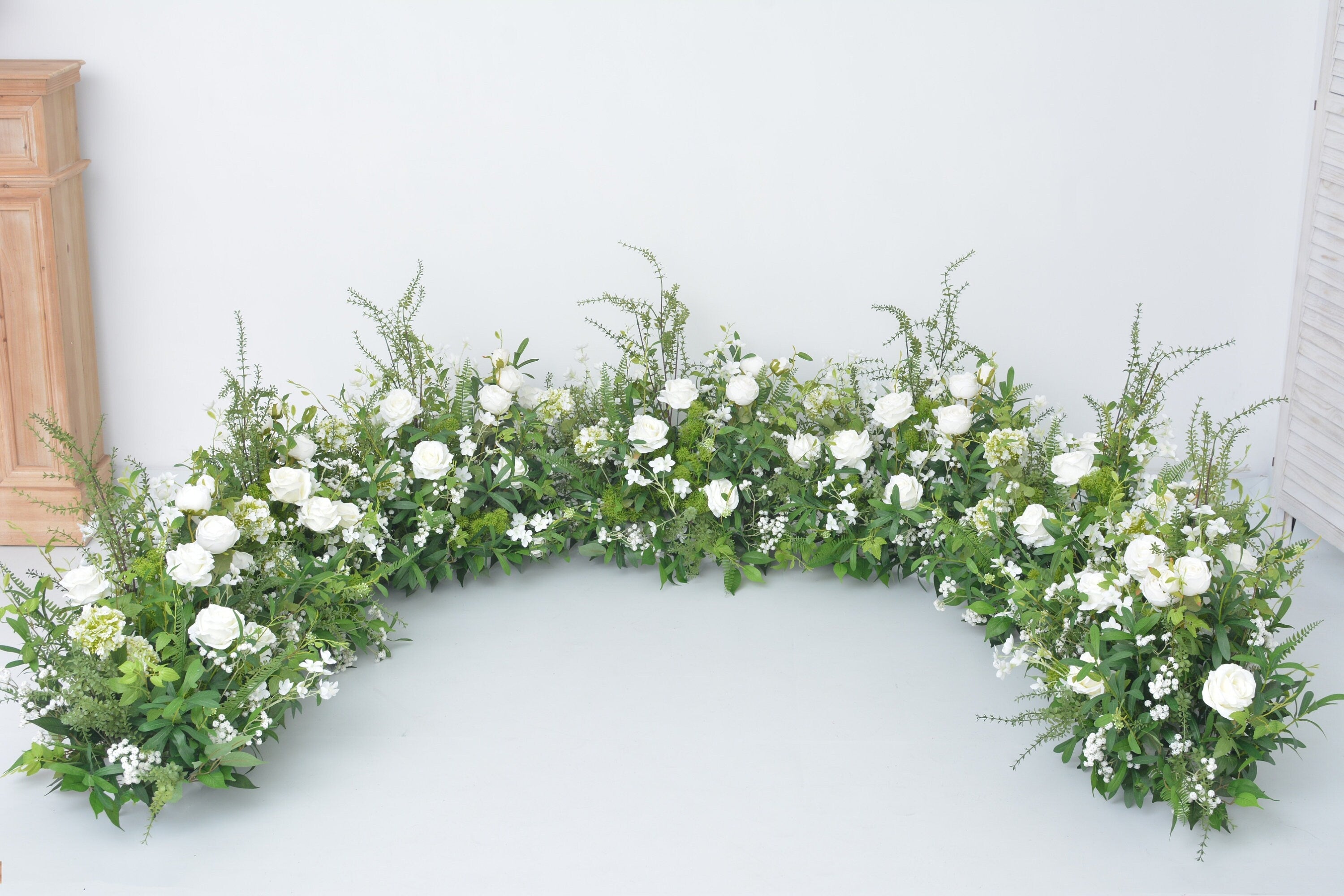 Grounded Arch Arrangements with Greenery and White Flowers