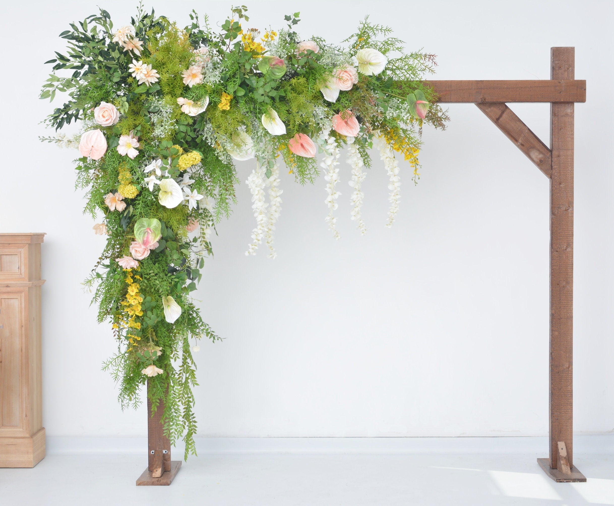 Lush Greenery Wedding Arch Arrangement with Champagne, Yellow, and White Flowers