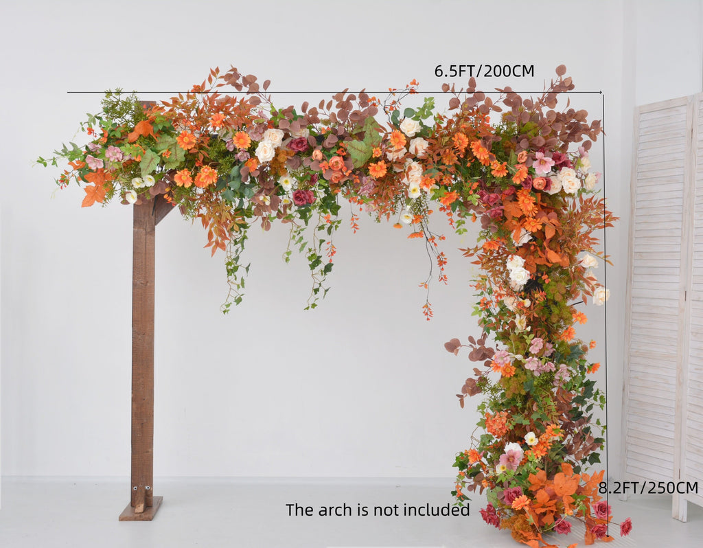 Fall Wedding Floral Arrangement with Pops of Orange, Red, and Champagne