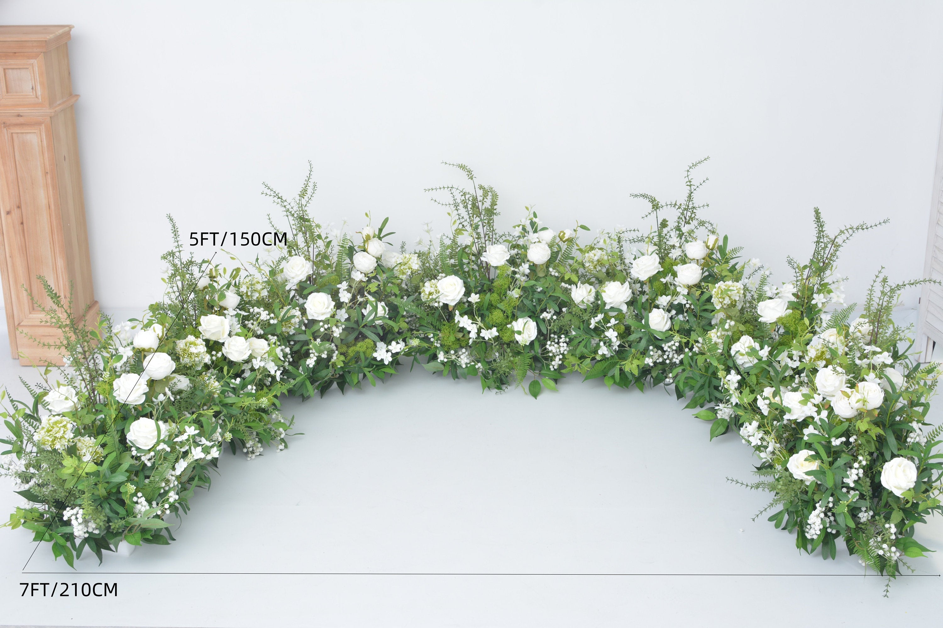 Grounded Arch Arrangements with Greenery and White Flowers