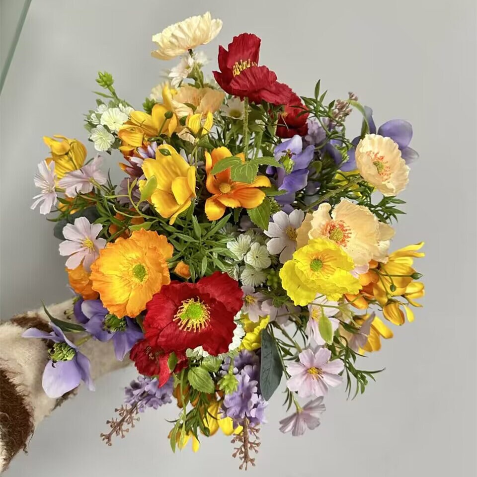Wildflower Themed Wedding Arch Arrangements in Purple, Orange, Red and Yellow