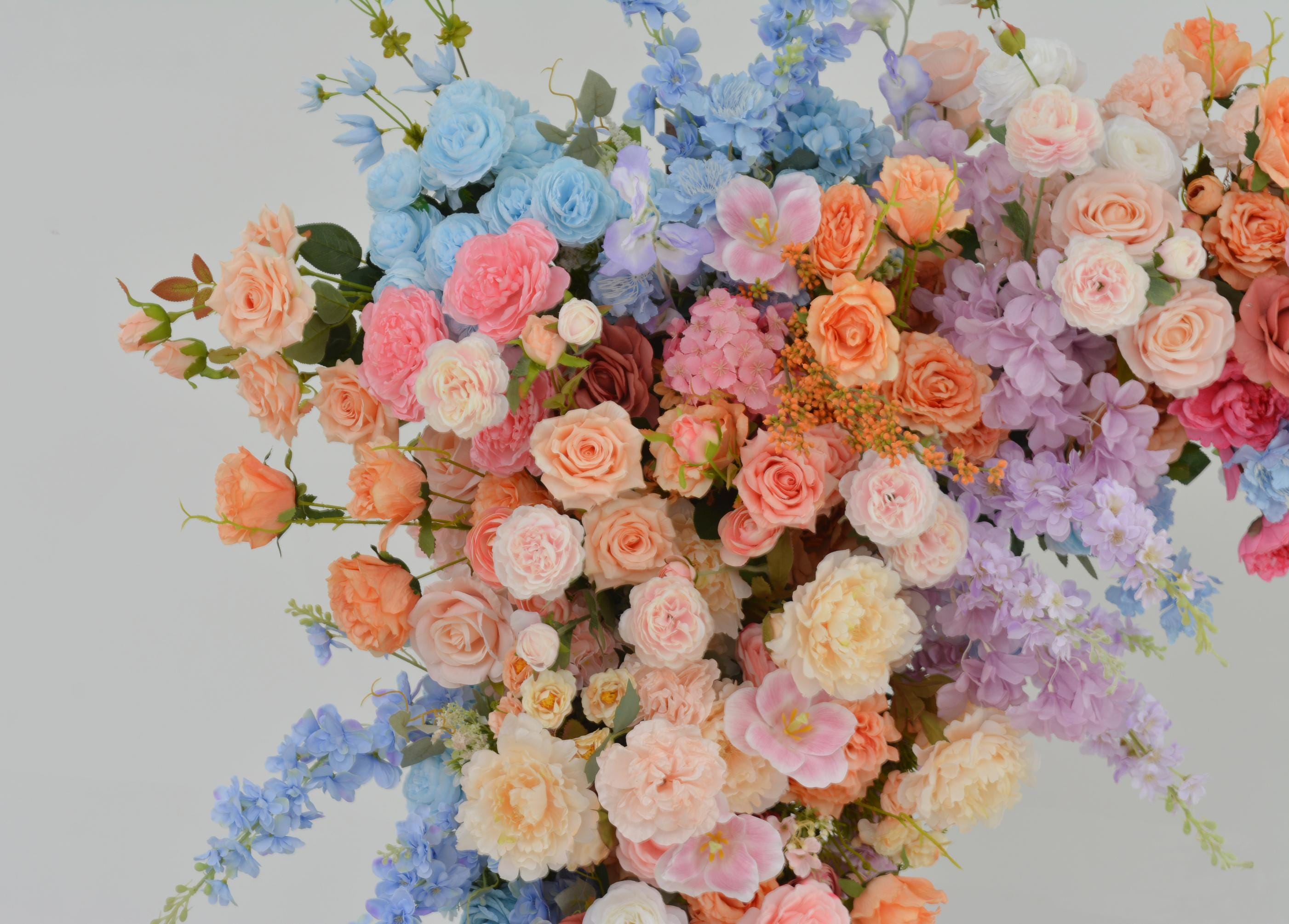 Pastel Wedding Arch Flower Arrangement with Soft Peach, Blush Pink, Baby Blue, and Lavender