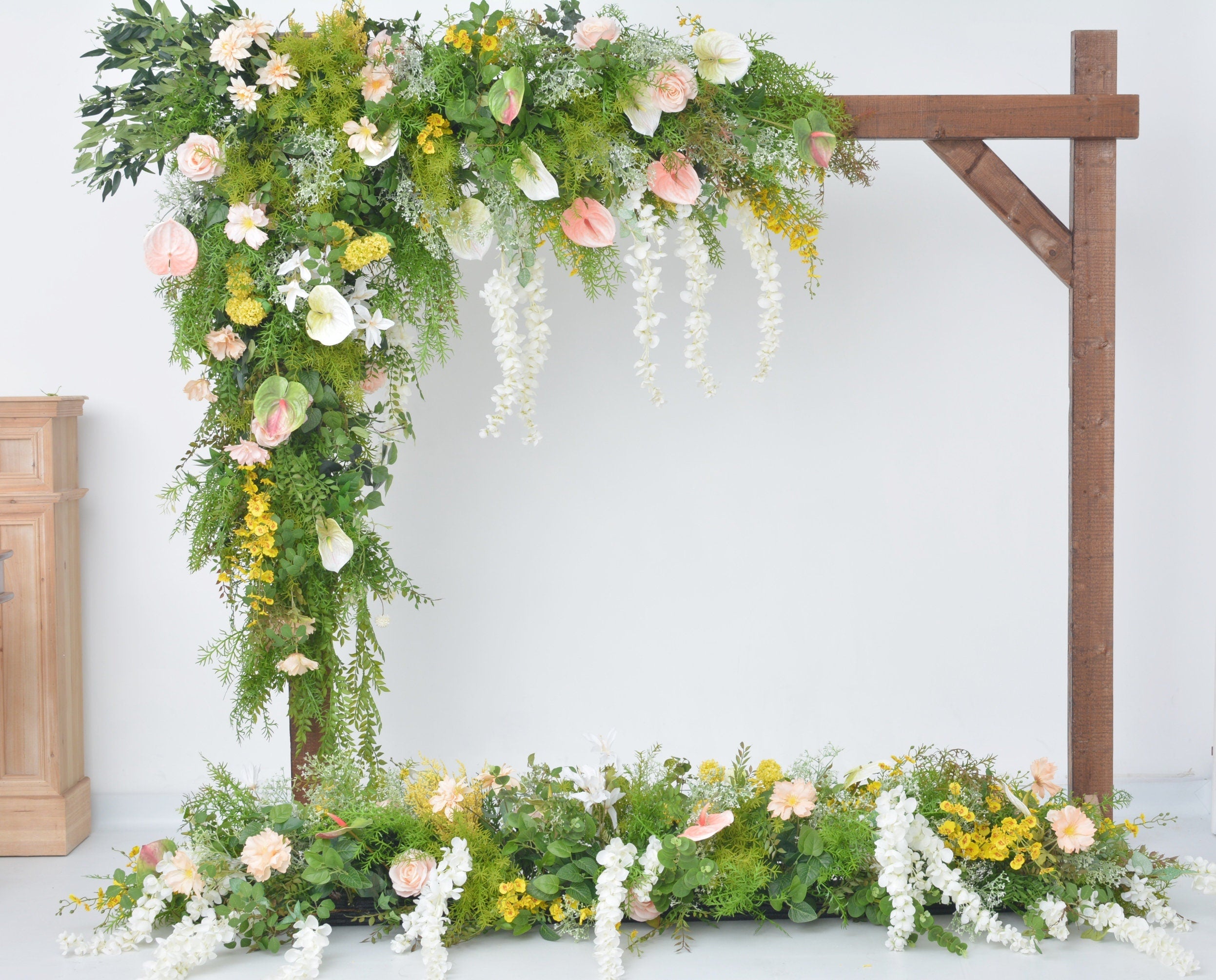 Lush Greenery Wedding Arch Arrangement with Champagne, Yellow, and White Flowers