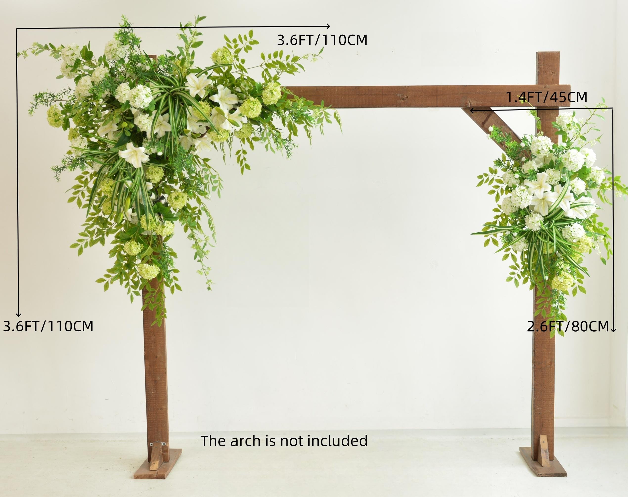 Elegant Wedding Arch with White and Green Floral Arrangement