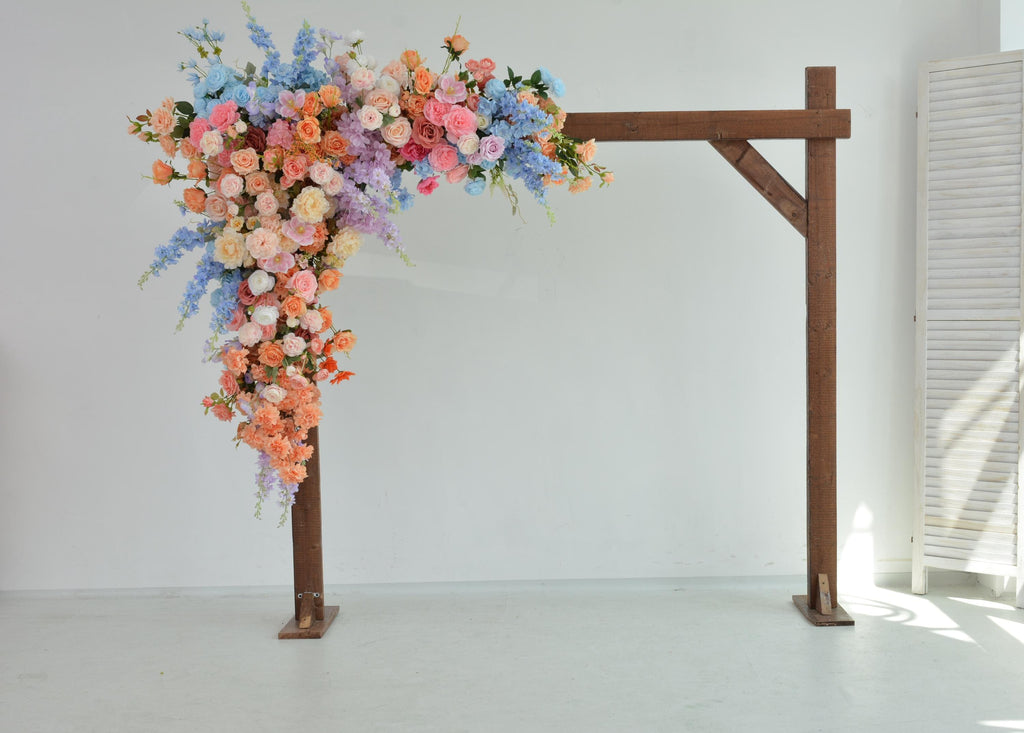 Pastel Wedding Arch Flower Arrangement with Soft Peach, Blush Pink, Baby Blue, and Lavender