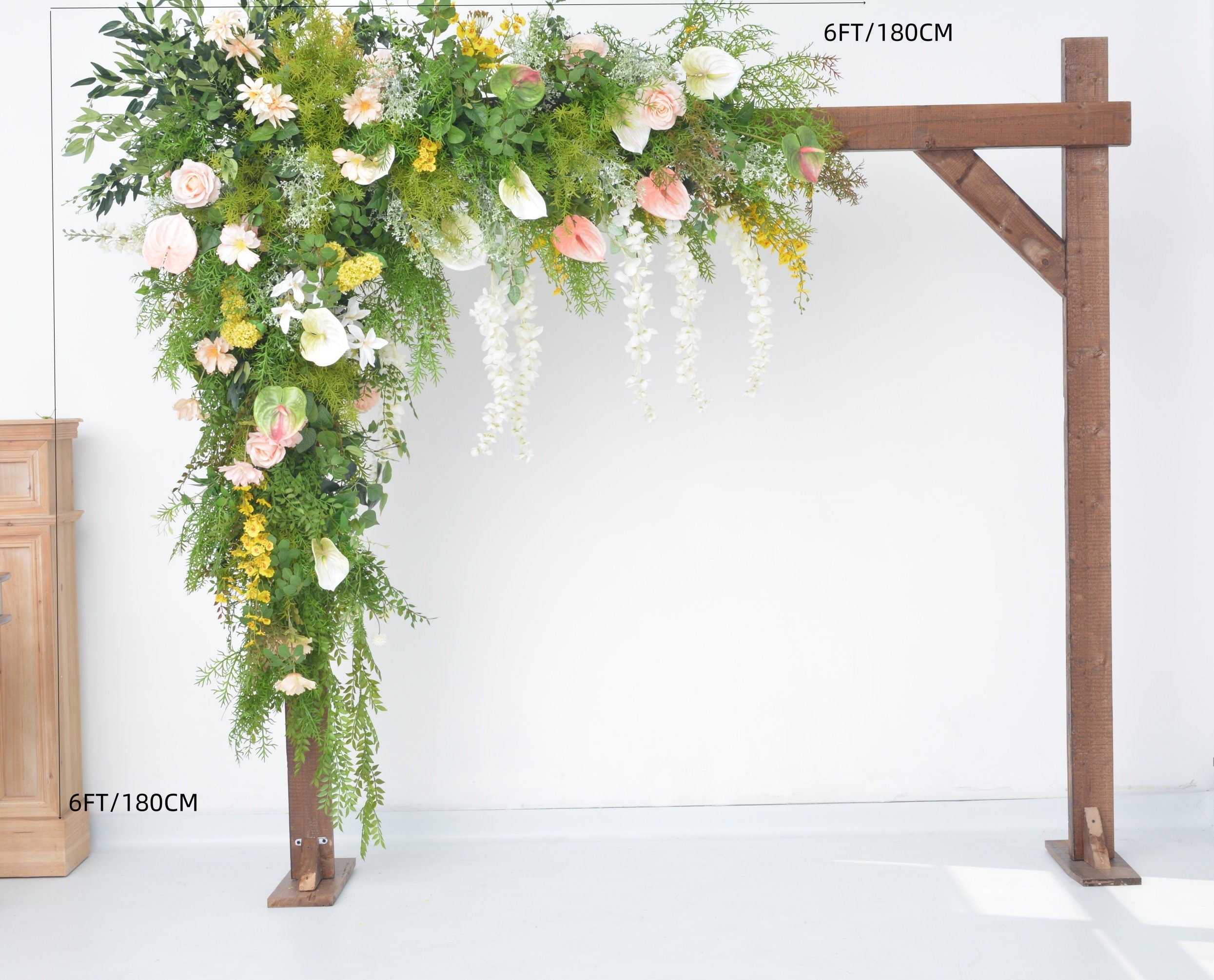 Lush Greenery Wedding Arch Arrangement with Champagne, Yellow, and White Flowers