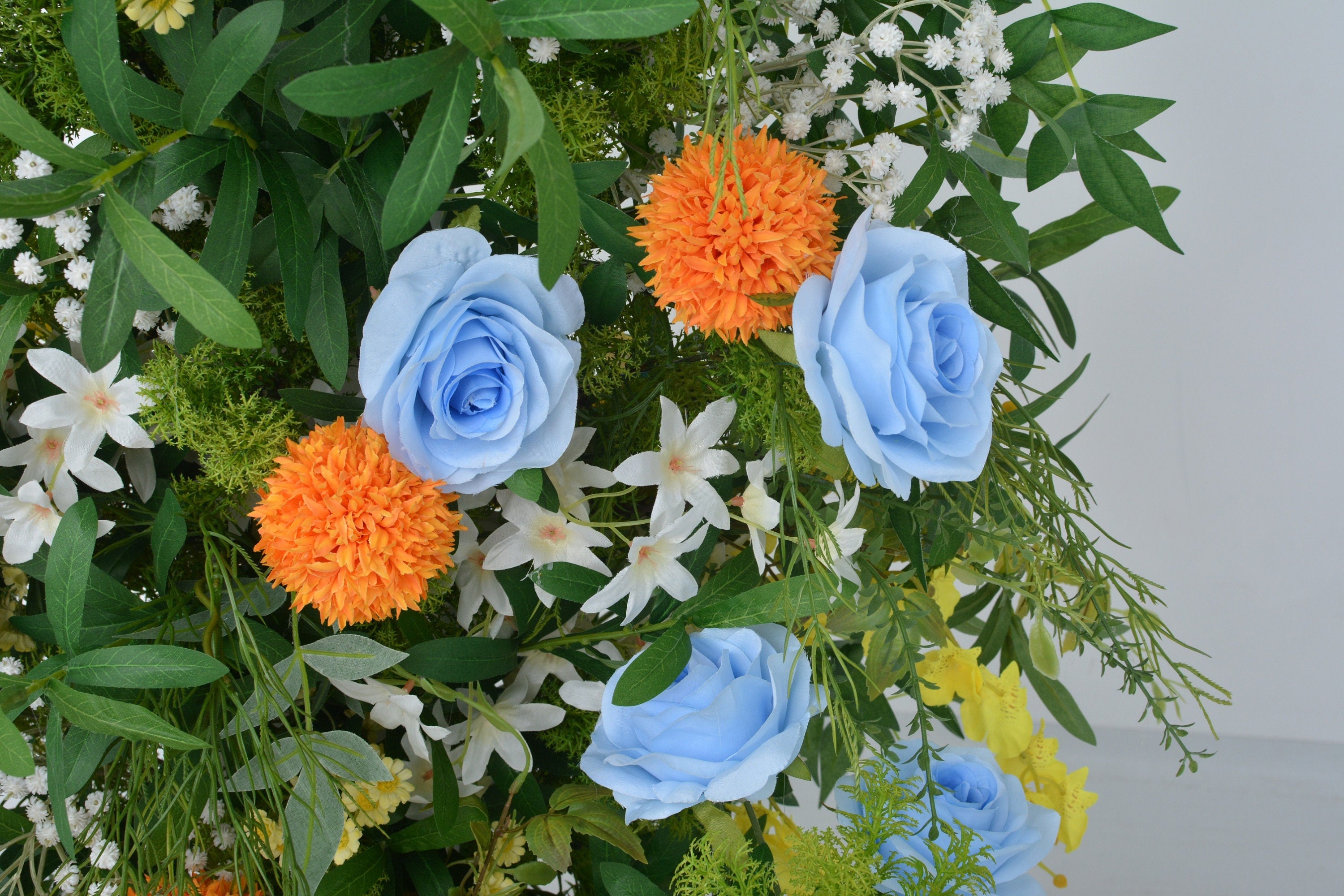 Elegant Horn Arch Wedding Floral Arrangements with Lush Artificial Greenery