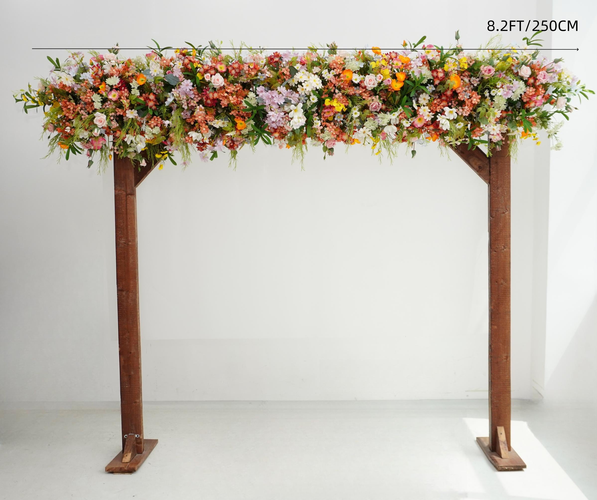 Wildflower Wedding Arbor Arrangements in Pastel Palette with a Splash of Orange and Light Blue