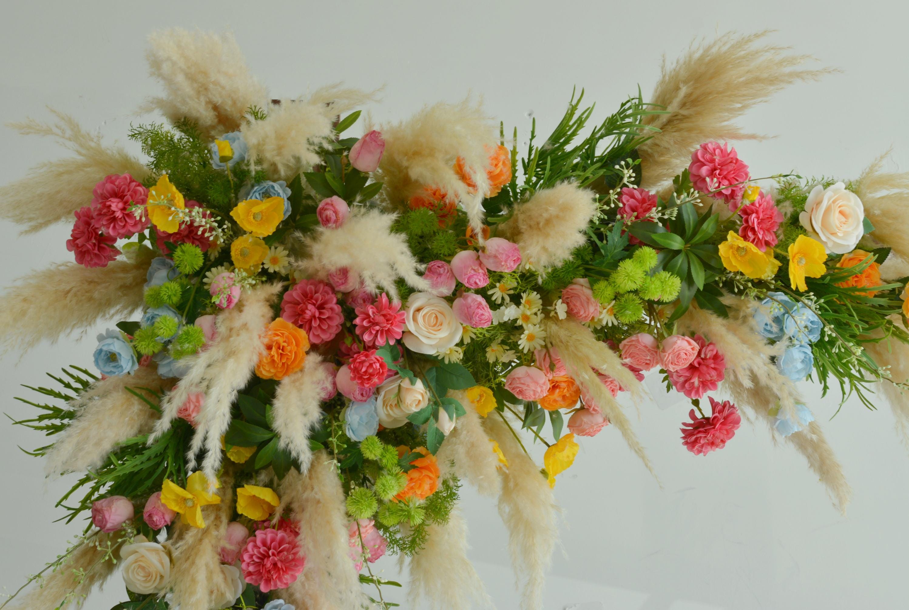Colorful Pampas Grass Wedding Arch Flowers: Light Blue, Peach Ceremony Decor