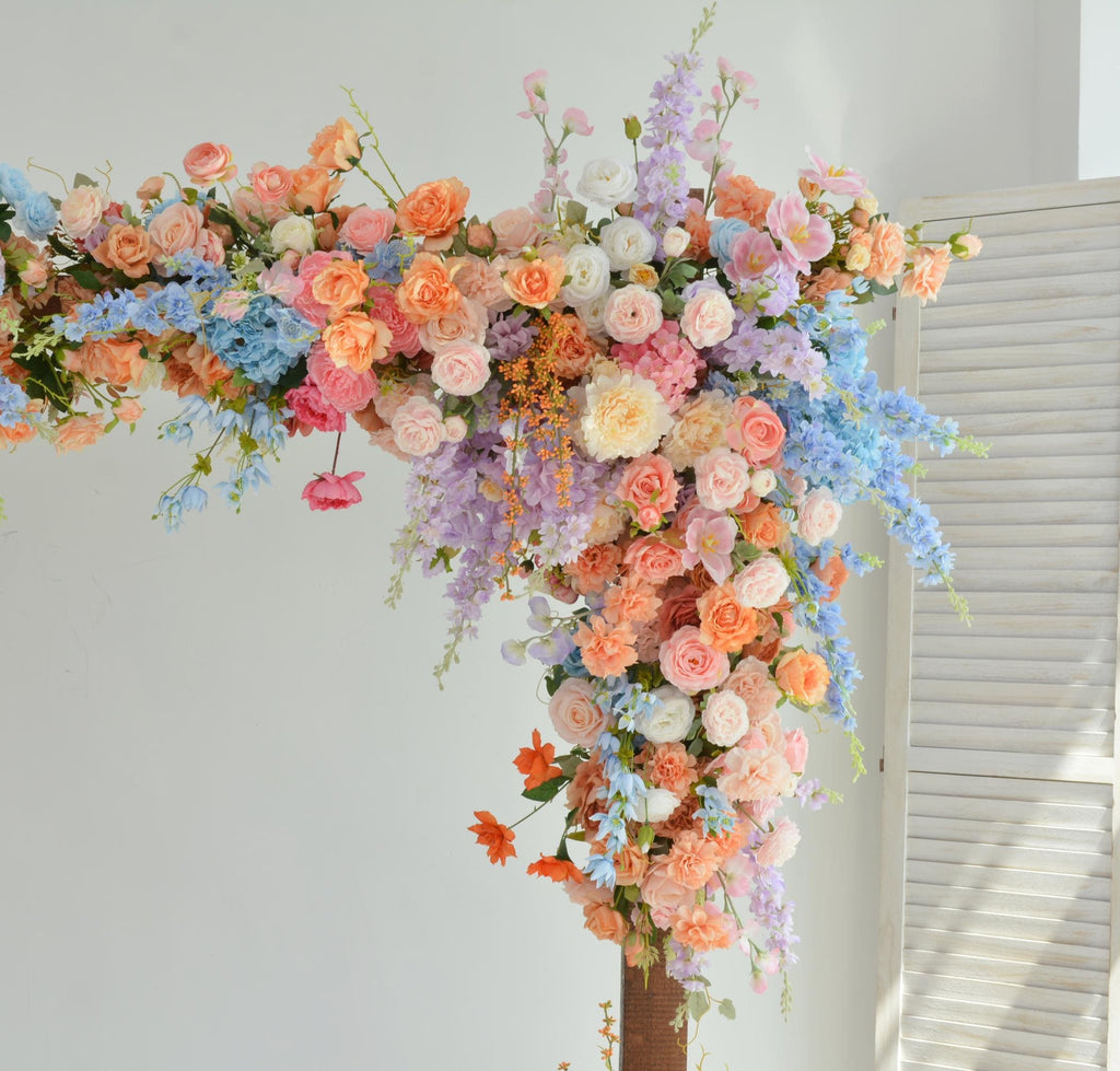 Pastel Wedding Arch Flower Arrangement with Soft Peach, Blush Pink, Baby Blue, and Lavender